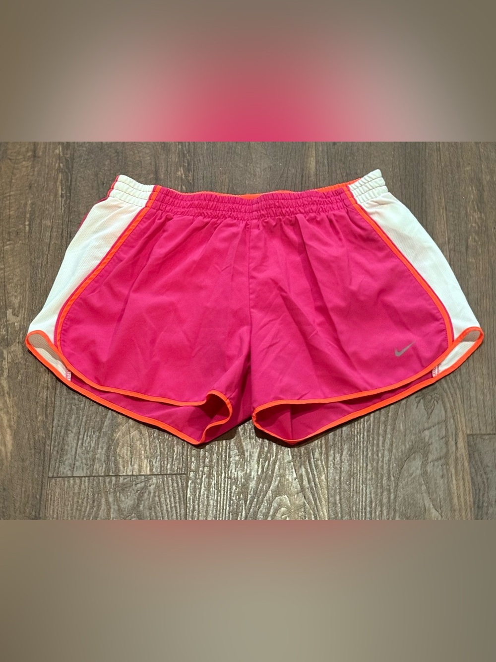Nike Women's Bright Pink Athletic Shorts with Orange Trim